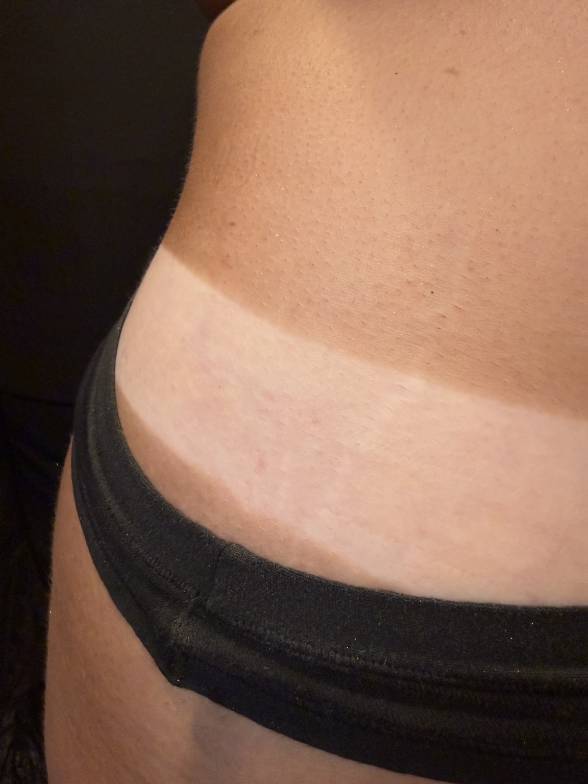 Sunless tan result showing an even, natural-looking finish
